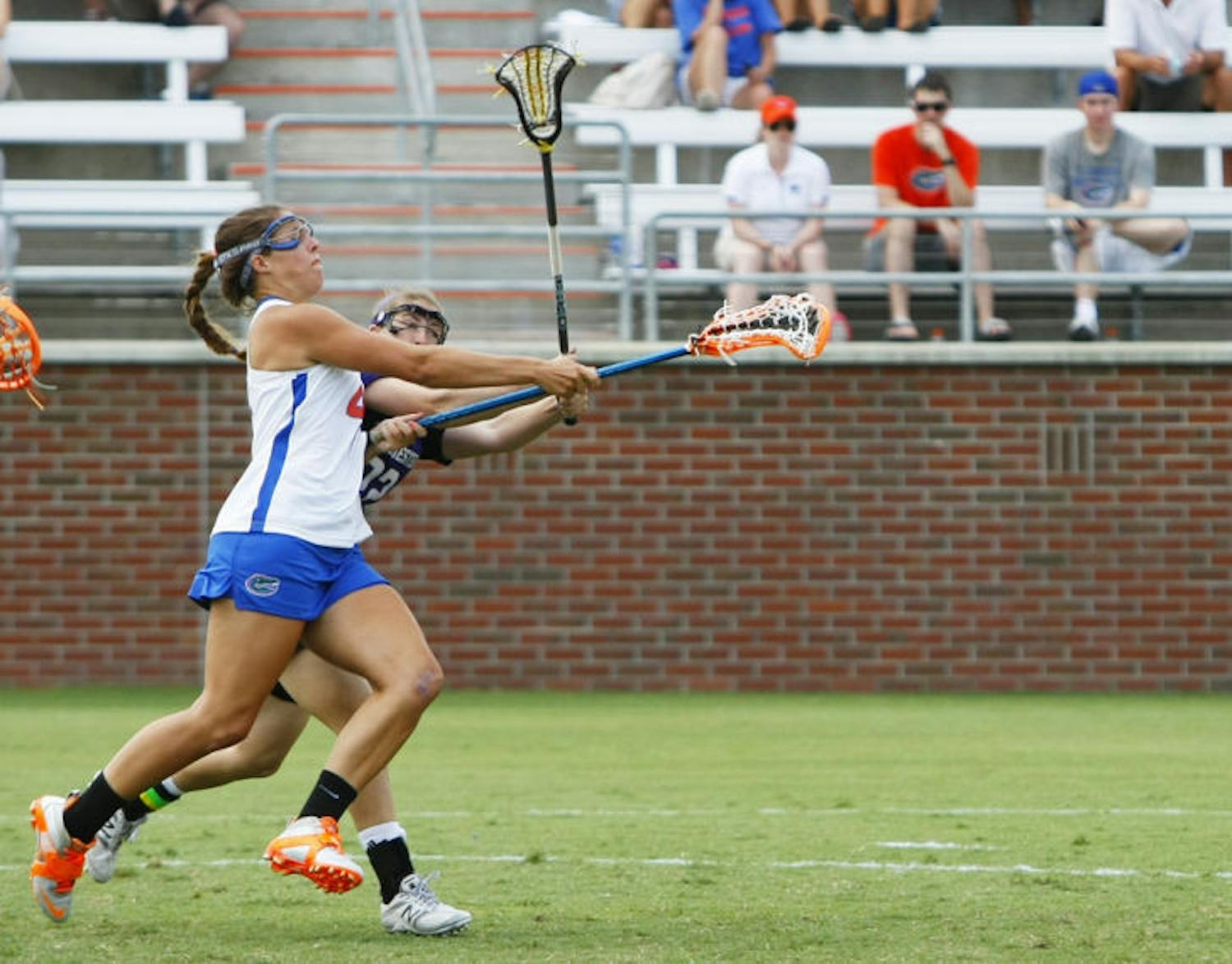 Senior Kitty Cullen attempts a shot during Florida’s 14-7 win against Northwestern in the ALC Championship Game on May 5, 2012, at Dizney Stadium. Cullen said teammate Ashley Bruns could beat any defender when Bruns attacks from the crease.