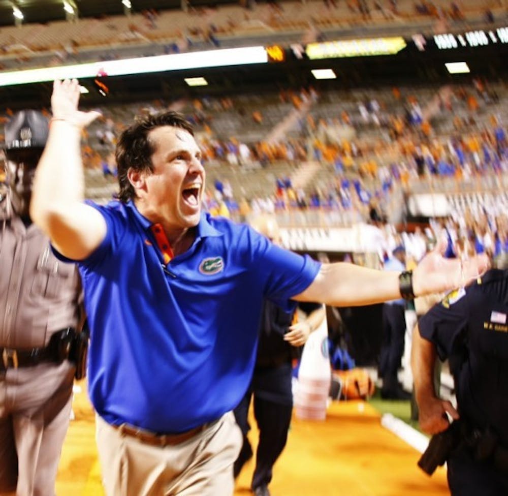 <p>UF head coach Will Muschamp, celebrates after their 37-20 victory against Tennessee on Sept. 15, 2012 at Neyland Stadium in Knoxville, Tenn.</p>