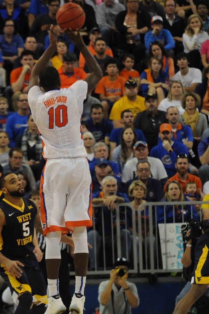 Dorian Finney-Smith attempts a three-pointer during Florida’s win over West Virginia on Jan. 30, 2016, in the O’Connell Center.