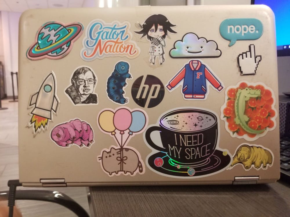 Ariana Gonzalez is a 20-year-old UF student with a deep fascination in space, and she covers her laptop with stickers related to that topic. She is a junior majoring in physics, which she finds a fun subject. Gonzalez once learned about Water Bears, a microscopic organism that can survive the vacuum of space, so she got stickers of them for her laptop. She also got a sticker of Stephen Hawking when he died in honor of his contribution to physics. Though most of her stickers are space-related, some are just for their aesthetics.&nbsp;
&nbsp;