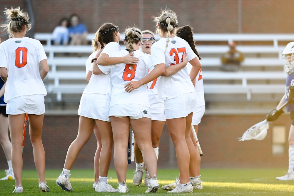 <p>The Florida Gators lacrosse team celebrates its 22-2 win in its exhibition match against the Scotland National Team, Feb. 14, 2024. </p>