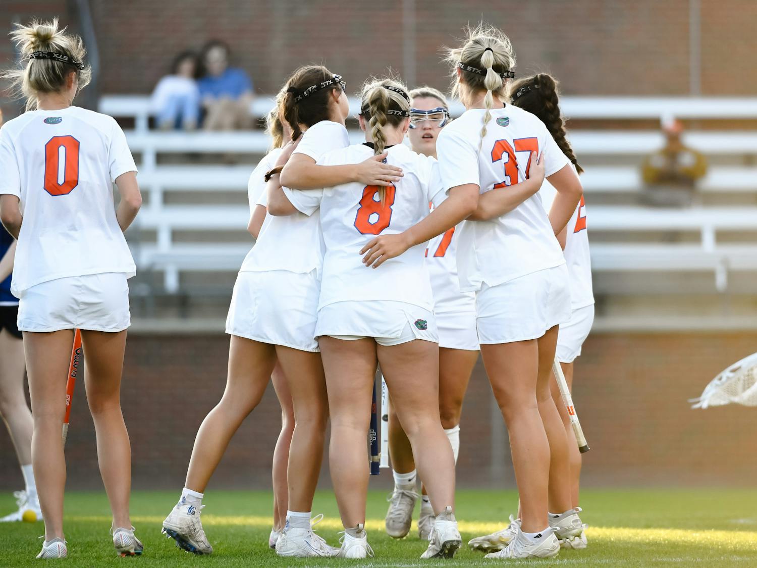 The Florida Gators lacrosse team celebrates its 22-2 win in its exhibition match against the Scotland National Team, Feb. 14, 2024.