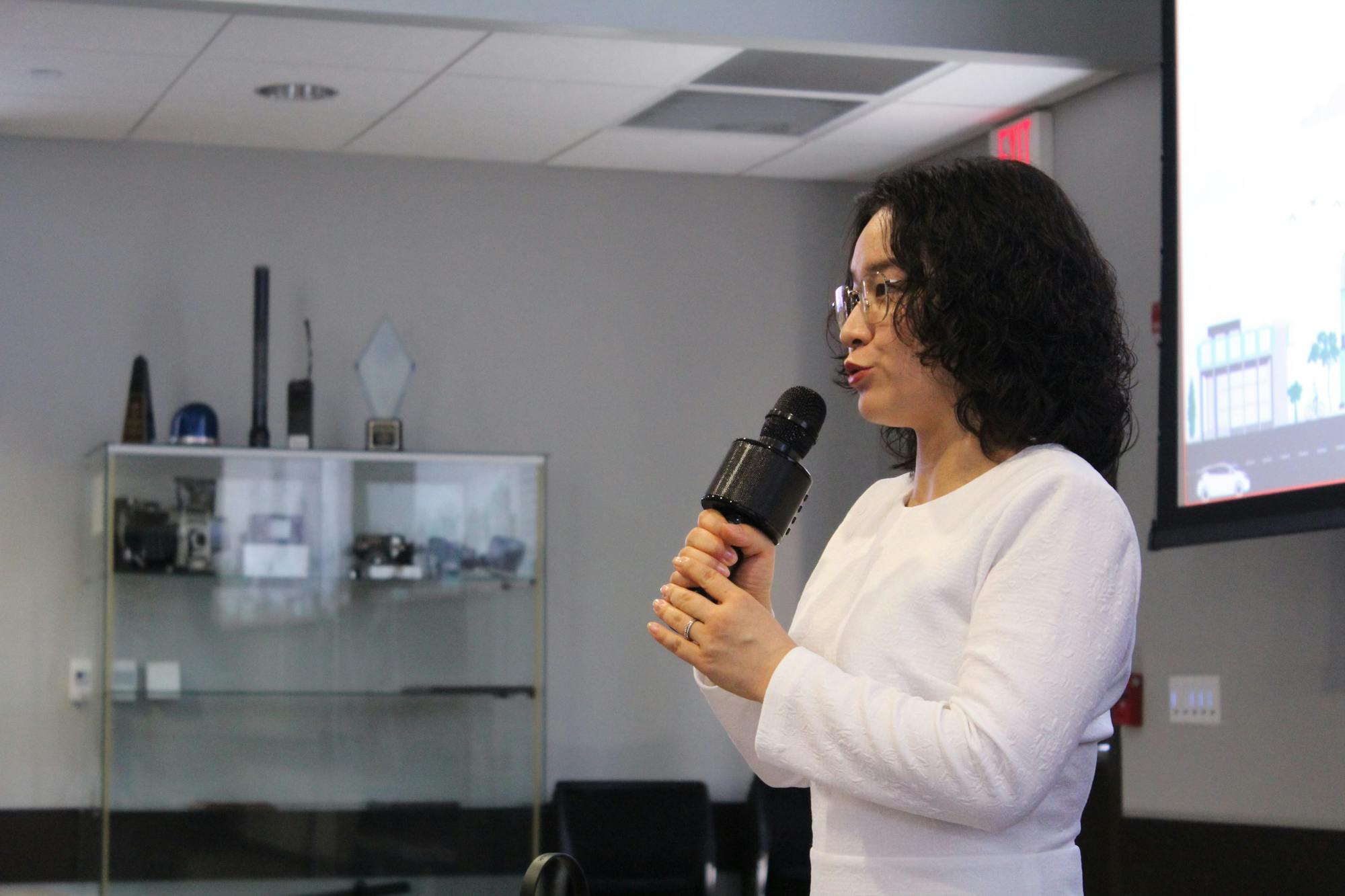 City of Gainesville Chief Climate Officer Dan Zhu unveils first draft of city climate action plan Wednesday, Sept. 18, 2024, to activists and concerned citizens offering community input.