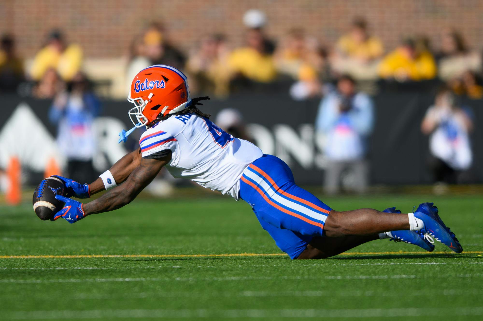 Florida wide receiver TJ Abrams (4) misses a catch during the second half of an NCAA college football game against Missouri, Saturday, Oct. 3, 2026, in Columbia, Mo.