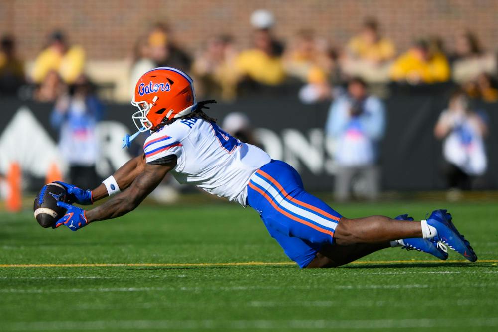 Florida wide receiver TJ Abrams (4) misses a catch during the second half of an NCAA college football game against Missouri, Saturday, Oct. 3, 2026, in Columbia, Mo.