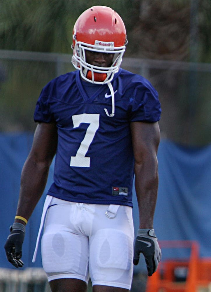 UF tight end Cornelius Ingram rests between drills during practice on the UF Practice Field Monday.(Andrew Stanfill / Alligator)