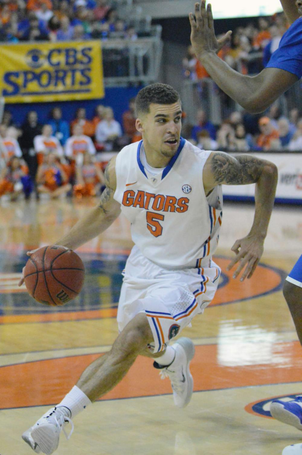 <p>Scottie Wilbekin drives down the court during Florida’s 84-65 win against Kentucky on Saturday in the O’Connell Center.</p>