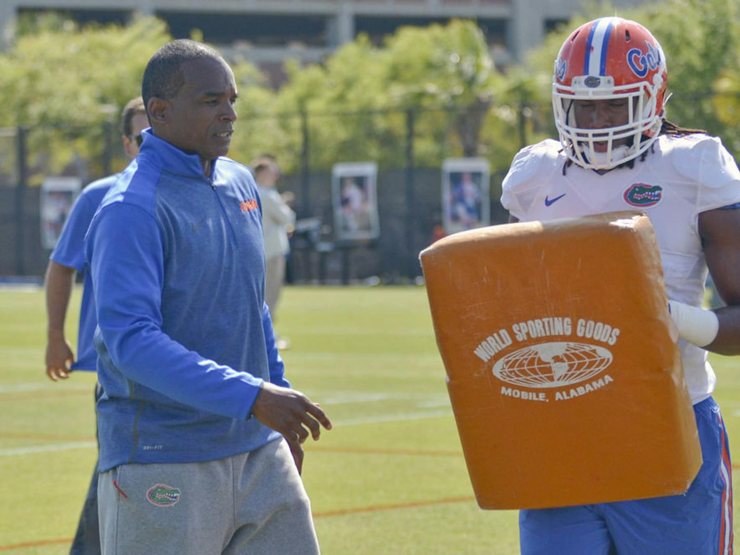 Randy Shannon coaches during practice on Monday at Donald R. Dizney Stadium.