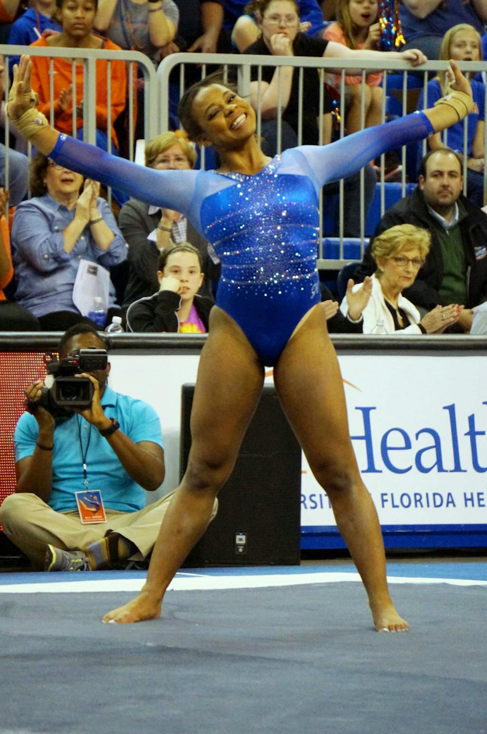 <p>Kennedy Baker performs her floor exercise during Florida's 197.60-196.950 win against Georgia on Friday in the O'Connell Center.</p>