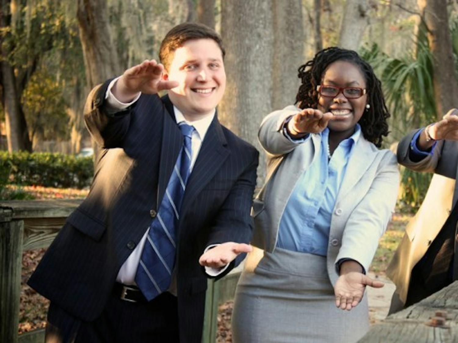 Unite Party executive candidates, Tj Villamil, Sabine Justilien and Juan Rodriguez, pose for a campaign photo.