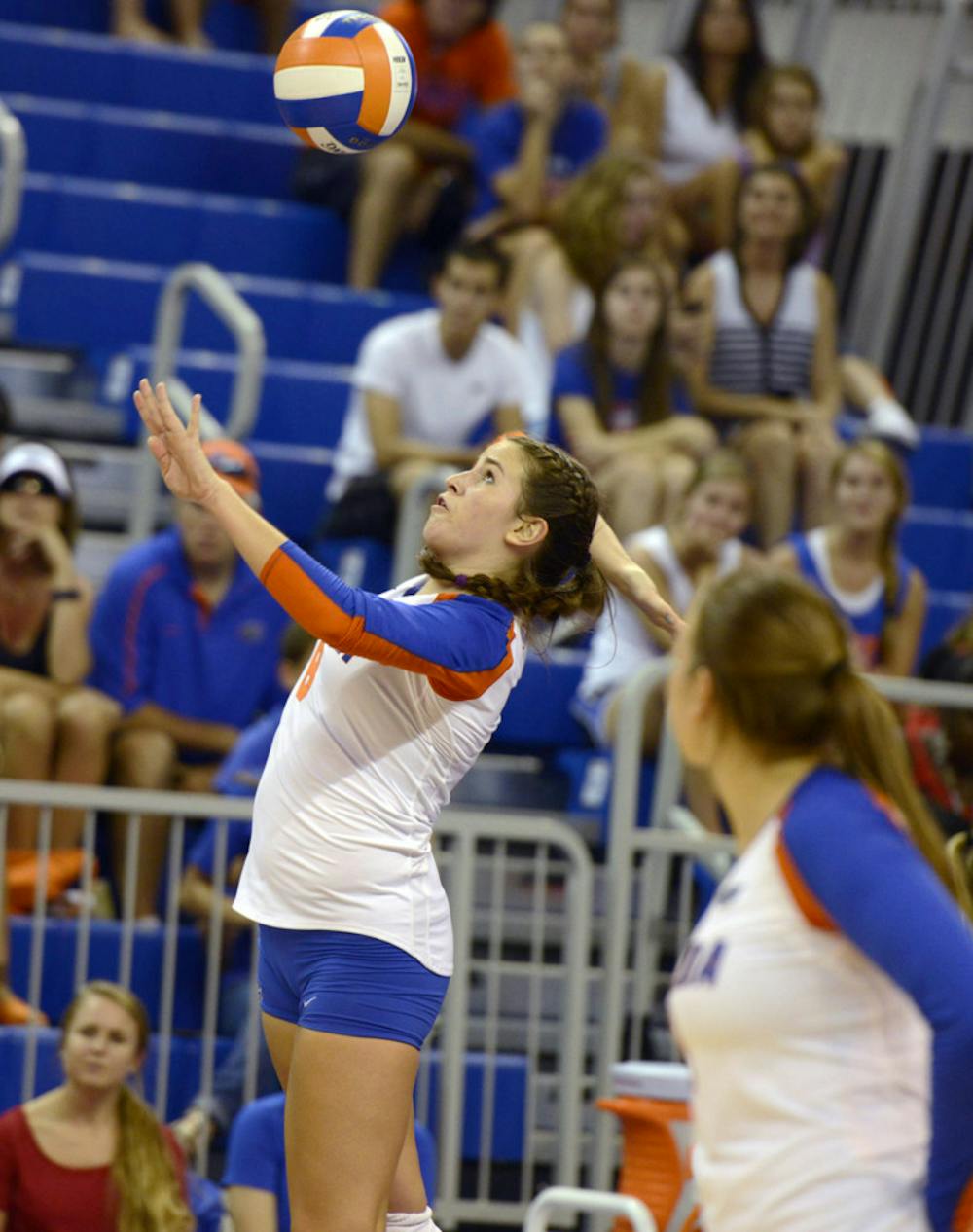 <p>Taylor Brauneis reaches for the ball during Florida’s 3-0 win against Duke on Aug. 31 in the O’Connell Center. Brauneis had 36 assists against UT-SA on Thursday.</p>