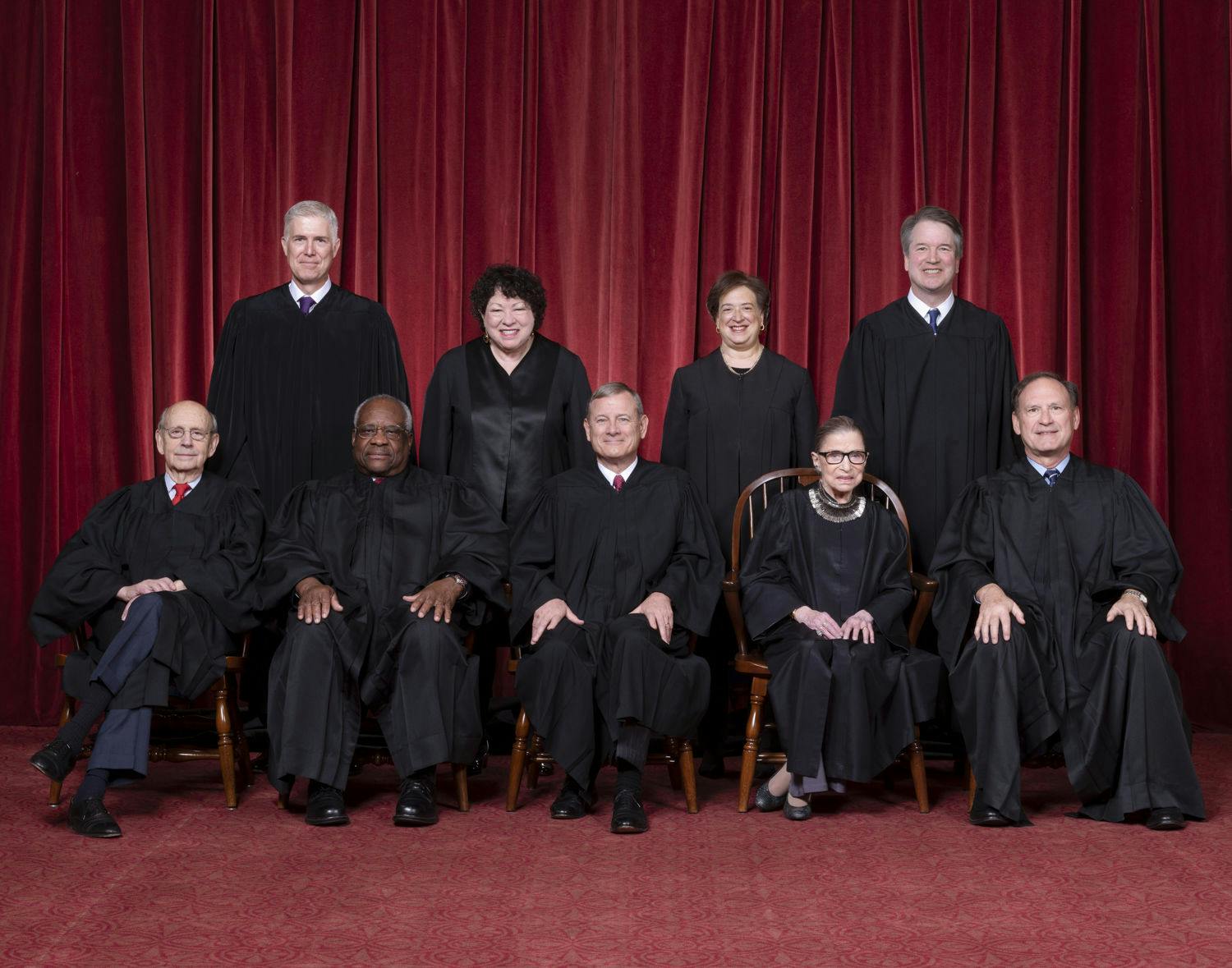 The Roberts Court, November 30, 2018. Seated, from left to right: Justices Stephen G. Breyer and Clarence Thomas, Chief Justice John G. Roberts, Jr., and Justices Ruth Bader Ginsburg and Samuel A. Alito. Standing, from left to right: Justices Neil M. Gorsuch, Sonia Sotomayor, Elena Kagan, and Brett M. Kavanaugh. Photograph by Fred Schilling, Supreme Court Curator's Office.