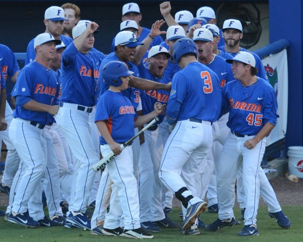 <p>Mike Zunino (3) celebrates with teammates after hitting a home run against Georgia Tech in the NCAA Gainesville Regional on June 2. Zunino had two of Florida’s four homers during the weekend.</p>