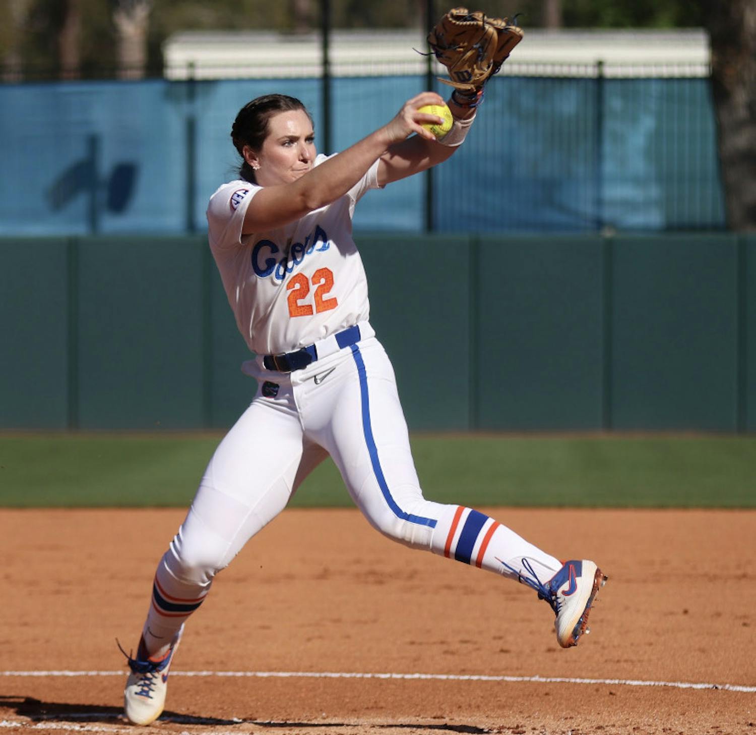 Elizabeth Hightower winds up in the pitcher’s circle against FSU March 3. Hightower earned her first win of the season Friday after a dominant relief appearance.