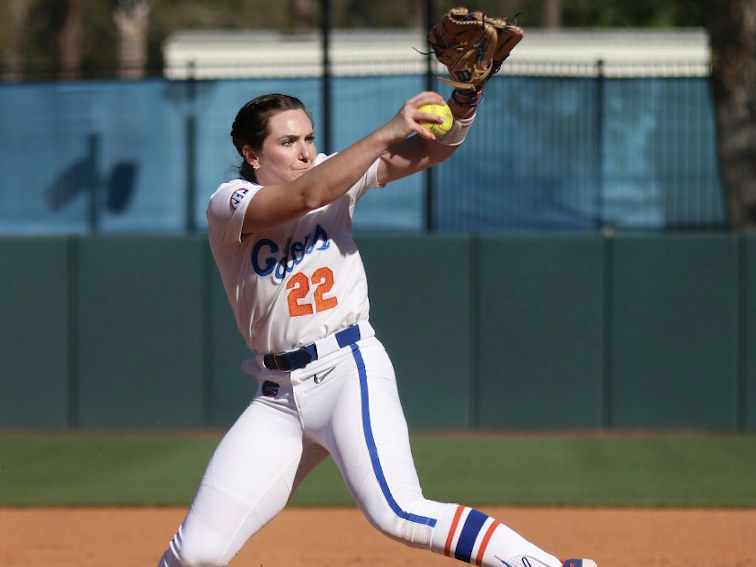 Elizabeth Hightower winds up in the pitcher’s circle against FSU March 3. Hightower earned her first win of the season Friday after a dominant relief appearance.