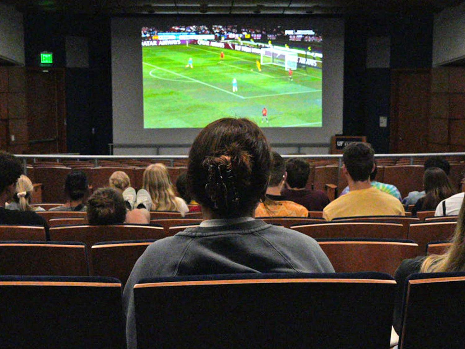 Attendees watch the Women’s World Cup Final game in Reitz Union Auditorium on Sunday, Aug. 20, 2023. Students arrived at 6 a.m. to watch Spain versus England. 