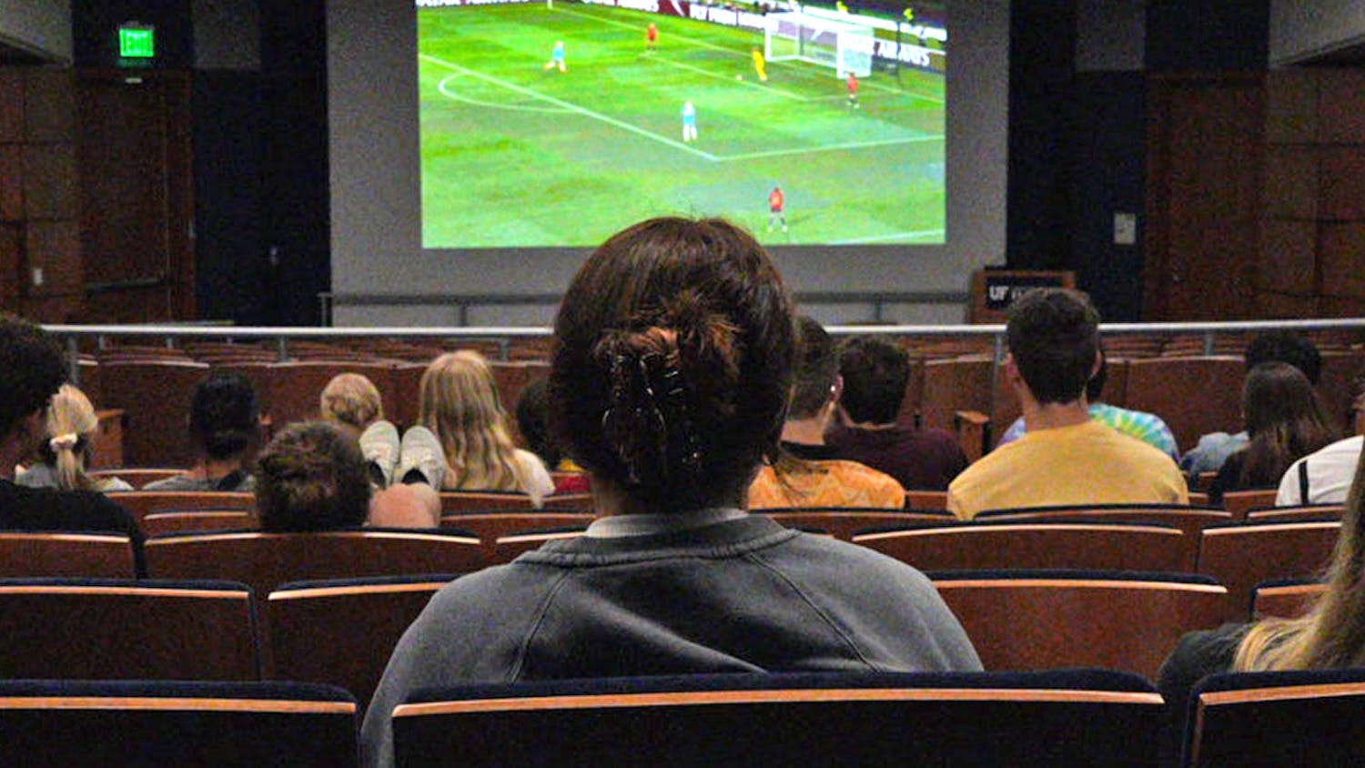 Attendees watch the Women’s World Cup Final game in Reitz Union Auditorium on Sunday, Aug. 20, 2023. Students arrived at 6 a.m. to watch Spain versus England. 
