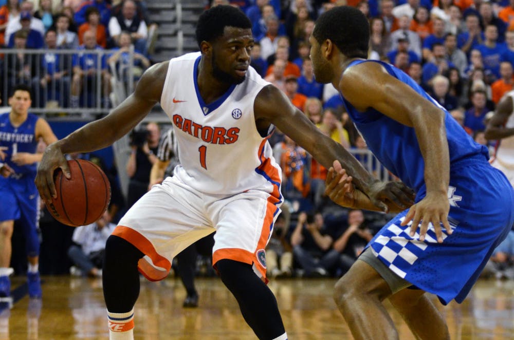 <p>Eli Carter dribbles during Florida's 68-61 loss to No. 1 Kentucky on Feb. 7 in the O'Connell Center.</p>