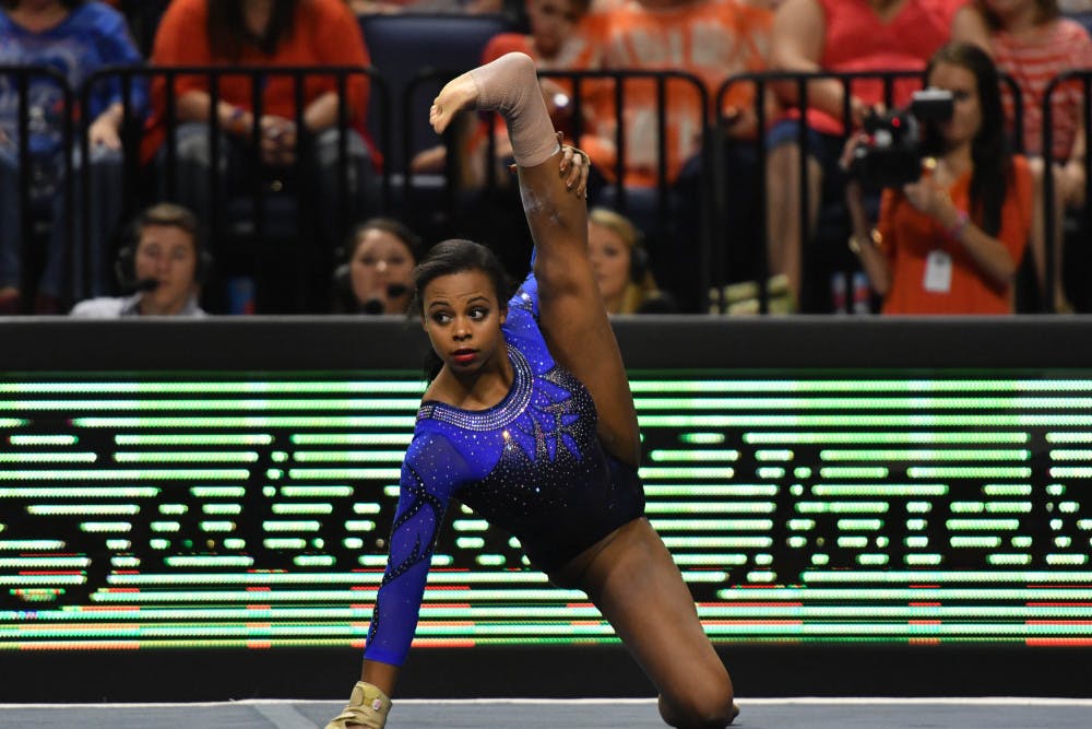 <p>Kennedy Baker performs her floor routine during Florida's win over Kentucky on Jan. 13, 2016, at the O'Connell Center. </p>