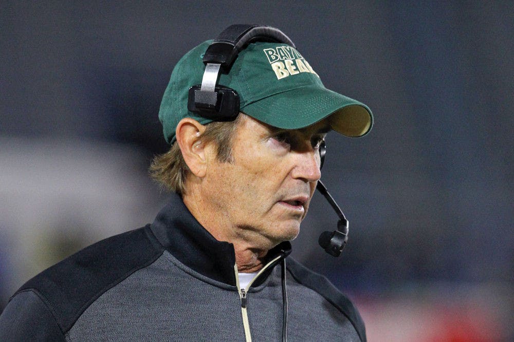 Baylor coach Art Briles walks the sideline during his team's NCAA college football game against Buffalo in Amherst, New York, on Sept. 12, 2014.