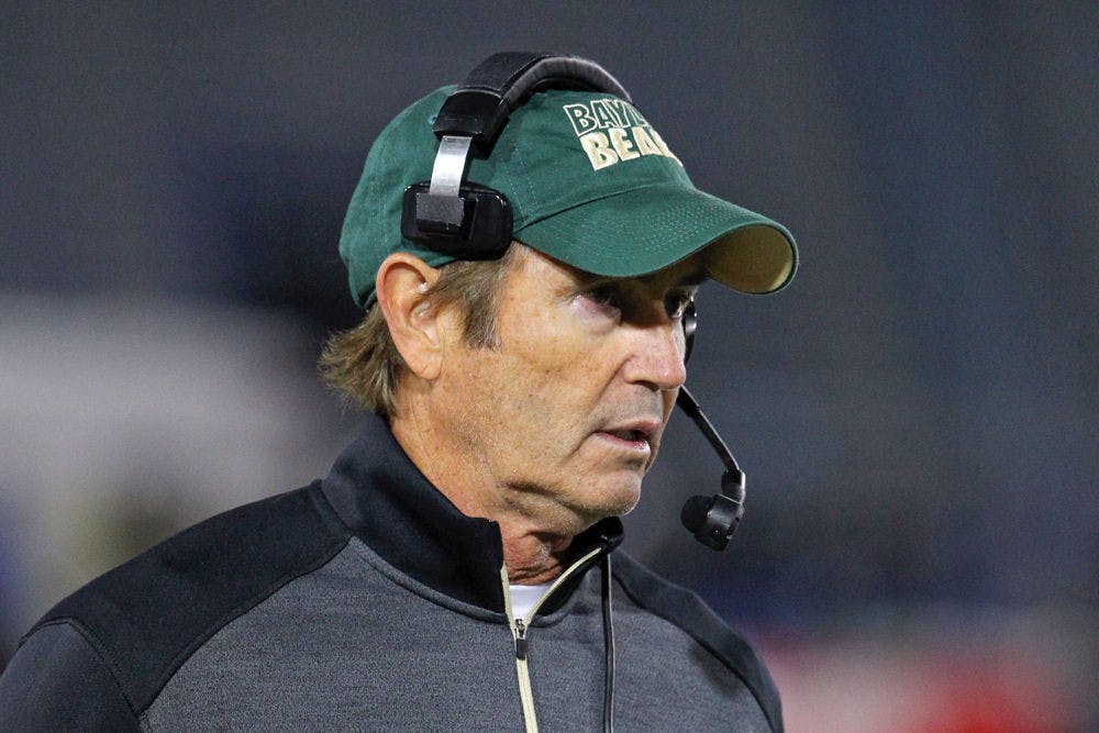 <p>Baylor coach Art Briles walks the sideline during his team's NCAA college football game against Buffalo in Amherst, New York, on Sept. 12, 2014.</p>
