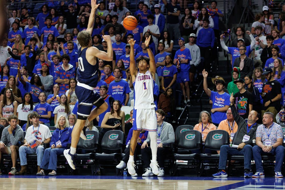 Florida Gators guard Xaivian Lee (1) takes a three pointer during the second half of a NCAA college basketball game against North Florida, Thursday, Nov. 06, 2025, in Gainesville, Fla.