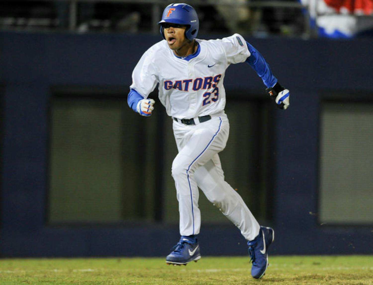 Buddy Reed runs toward home plate during Florida’s 4-0 win against Maryland on Feb. 14 at McKethan Stadium. Reed is hitting .154 in his first five college games.