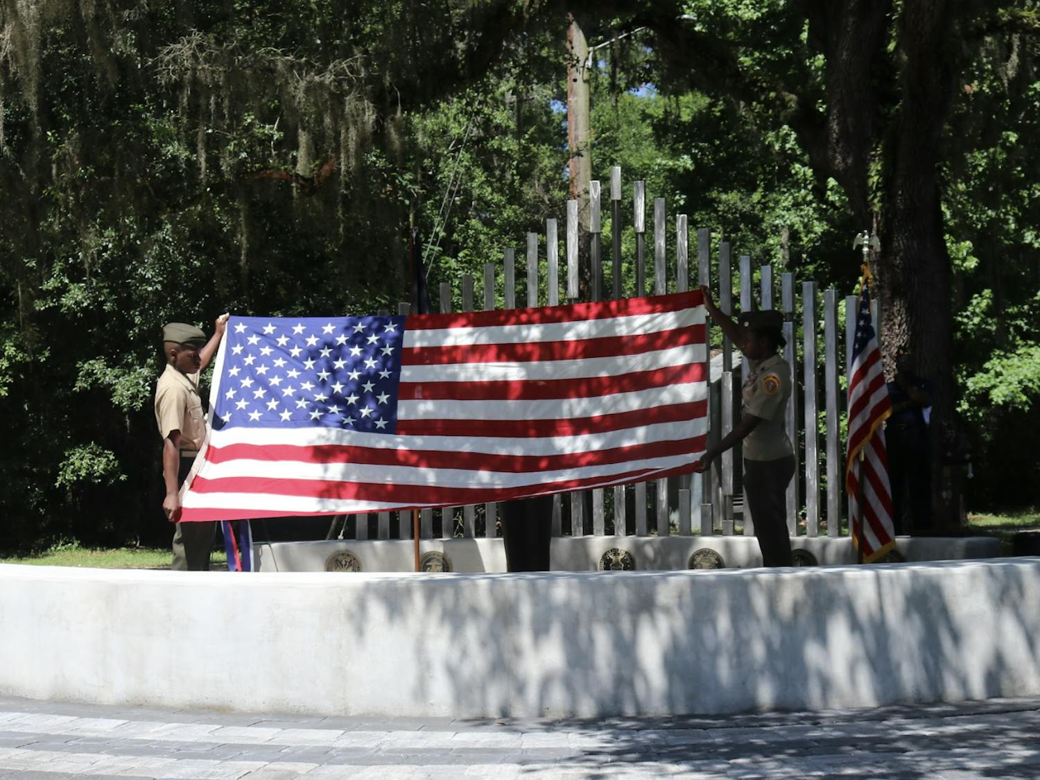 Milton Lewis Young Marines conducts the flag ceremony on Memorial Day at the Evergreen Cemetery May 30, 2022.
