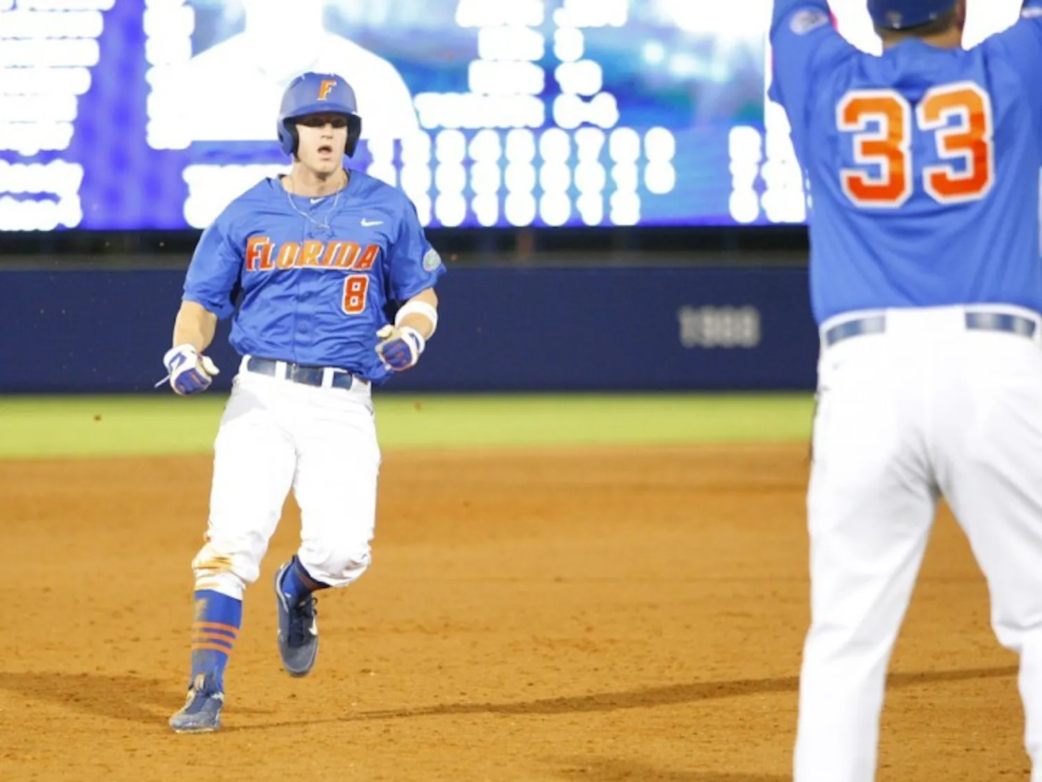 Senior outfielder Daniel Pigott (8) failed to tag up from third base and score the tying run after Preston Tucker hit a fly ball to right field in the bottom of the ninth inning in No. 1 Florida’s 7-6 loss No. 12 LSU.