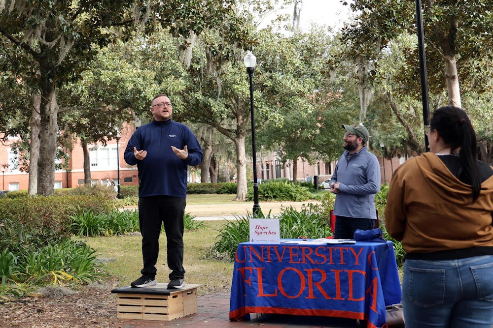 <p>Dennis McCarty, Director of Public Speaking Lab and Assistant Instructional Professor at the University of Florida studying Information Systems, takes a stand on the soap box for Hope Speech on Plaza of the Americas on Wednesday, Feb. 11, 2026, in Gainesville, Fla.</p>