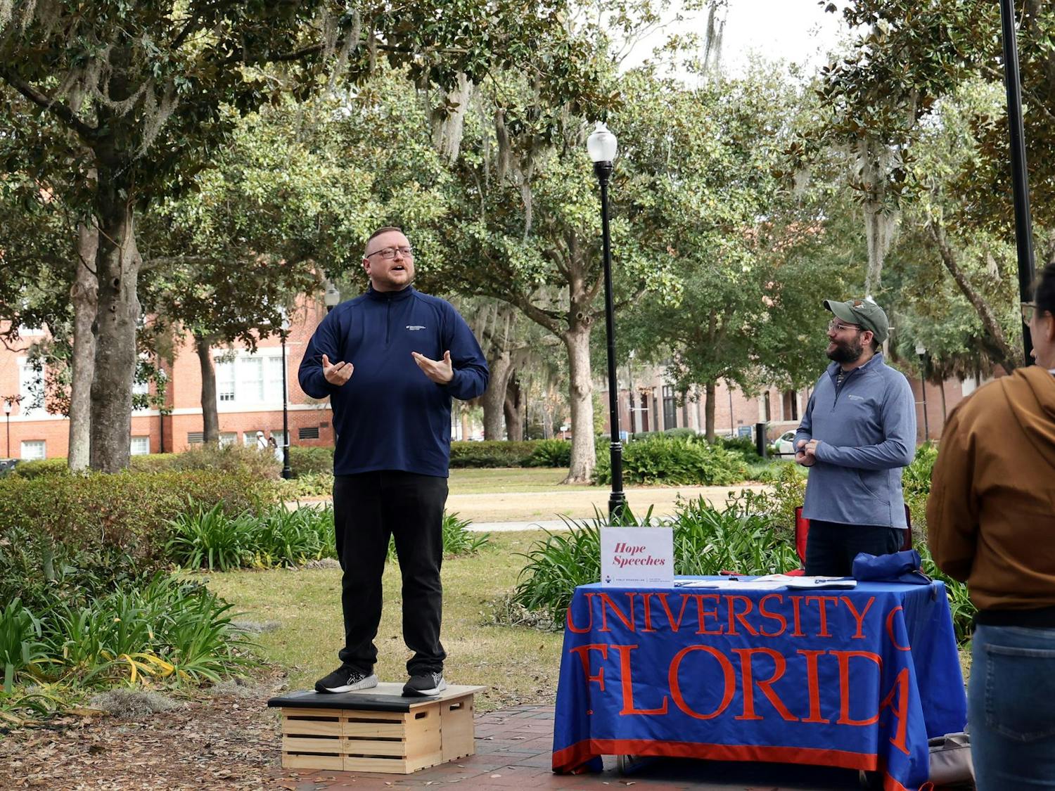 Dennis McCarty, Director of Public Speaking Lab and Assistant Instructional Professor at the University of Florida studying Information Systems, takes a stand on the soap box for Hope Speech on Plaza of the Americas on Wednesday, Feb. 11, 2026, in Gainesville, Fla.