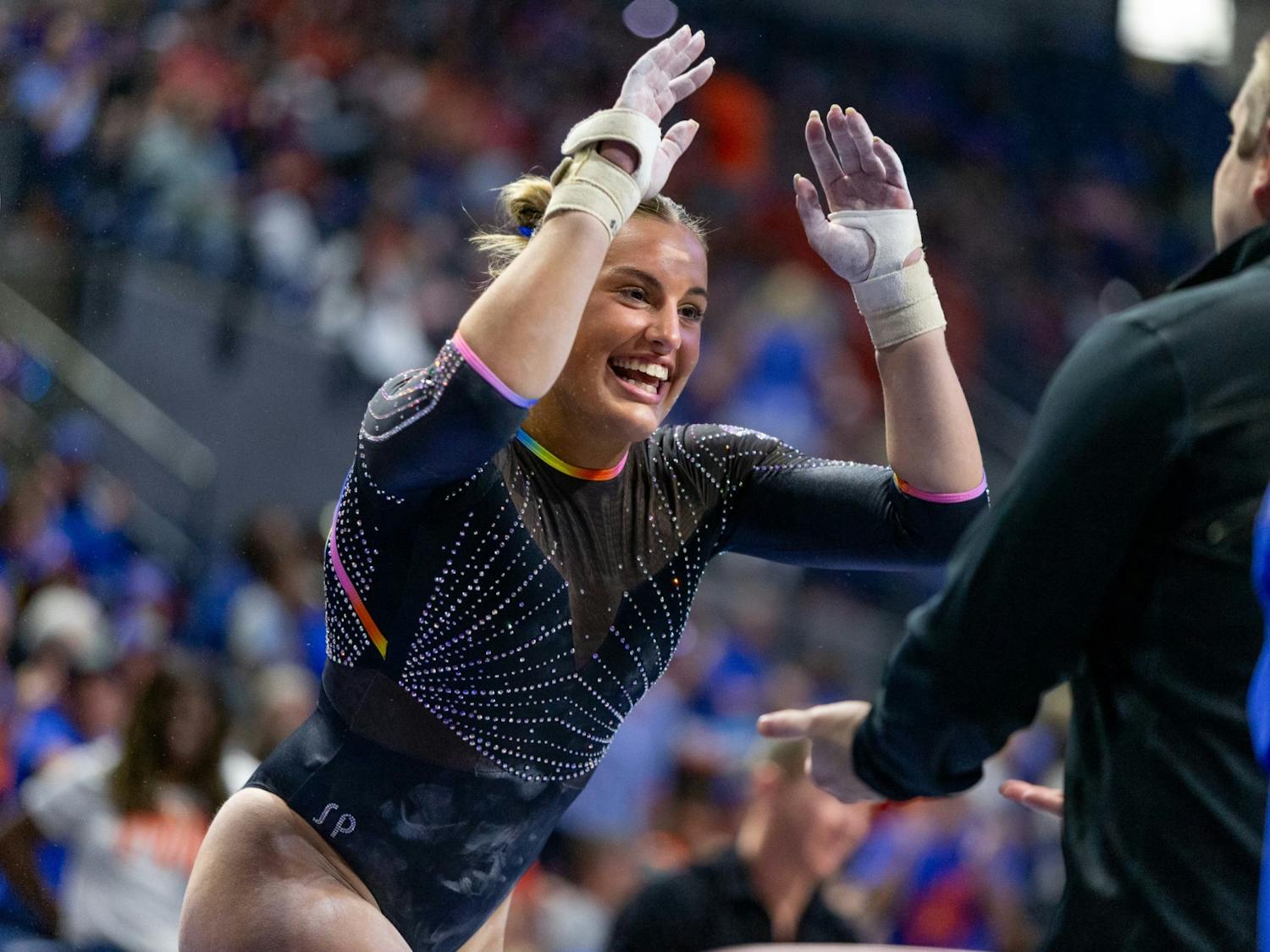Skylar Draser beams with excitement after her uneven parallel bars routine during the 2024 NCAA Gymnastics Gainesville Regional Finals on Sunday, April 7.
