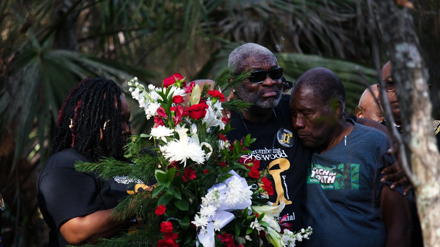 Host Sponsor Dr. Marvin Dunn stands with Rosewood descendent Gregory Doctor during the Rosewood Wreath Laying ceremony Sunday, Jan. 8, 2023.