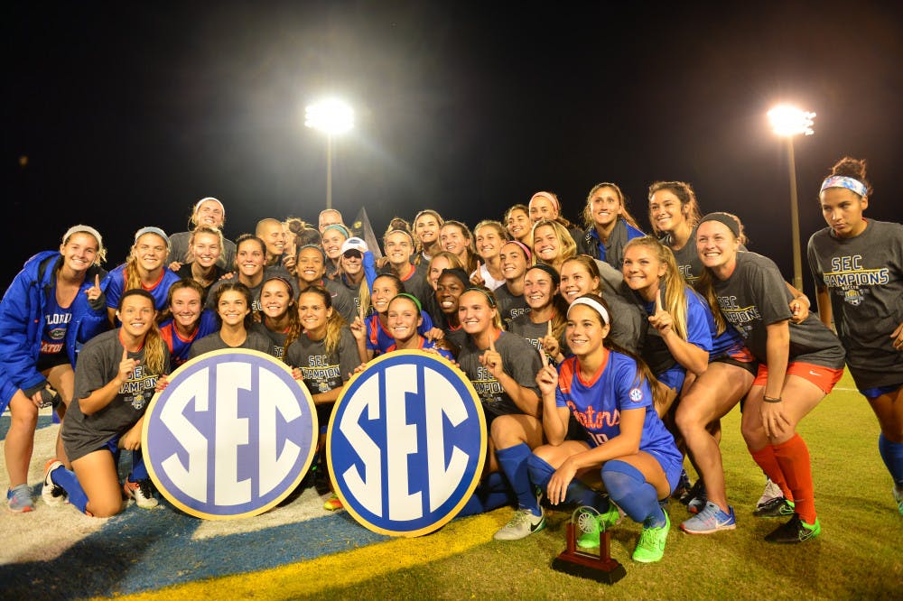 Florida celebrates its 2-1 overtime win in the 2016 Southeastern Conference Tournament championship match in Orange Beach, Alabama.