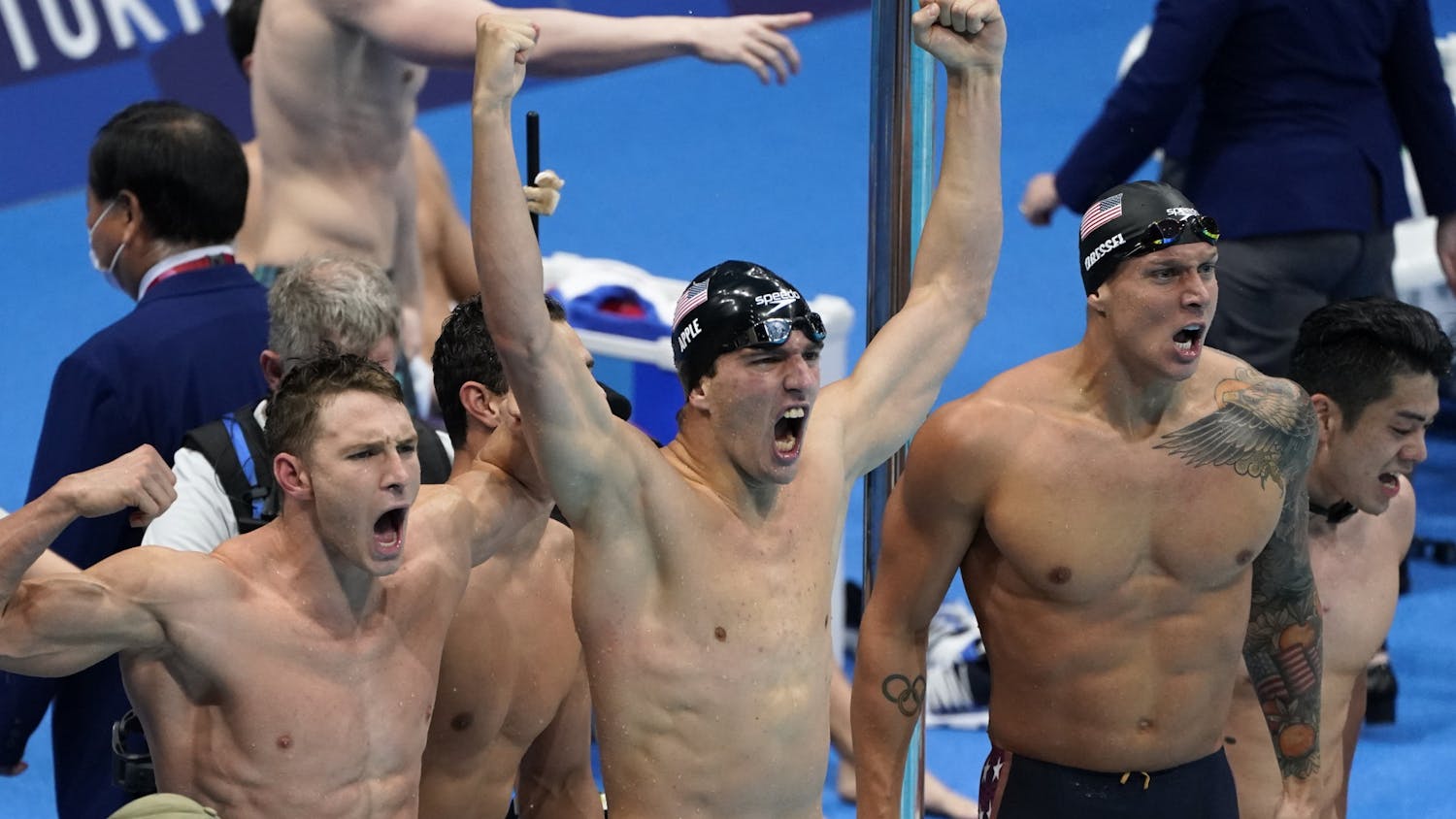 Caeleb Dressel, of United States, right, and teammates celebrate winning the gold medal in the men's 4x100-meter medley relay final at the 2020 Summer Olympics, Sunday, Aug. 1, 2021, in Tokyo, Japan. (AP Photo/Jae C. Hong)