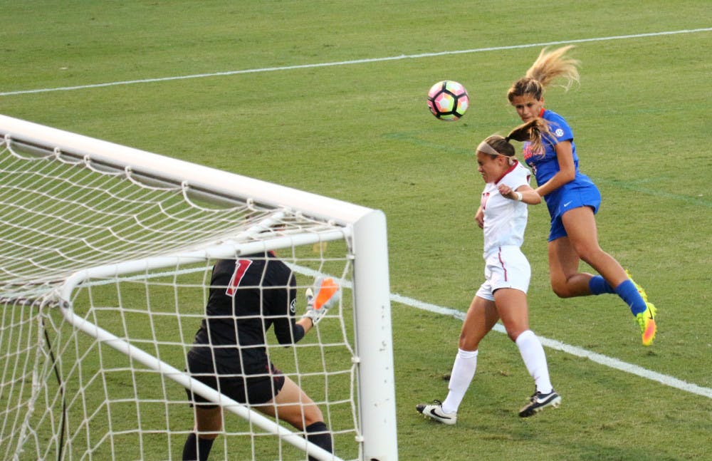 <p>Melanie Monteagudo (far right) heads the ball into the net during Florida's 6-0 win over Alabama on Oct. 20, 2016, at Donald R. Dizney Stadium.</p>