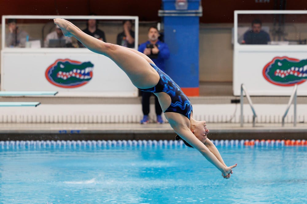 <p>Casey Greenberg dives during a meet between the Florida Gators and Florida State Seminoles at the Stephen C. O'Connell Center Natatorium on Friday, Jan. 30, 2026.</p>