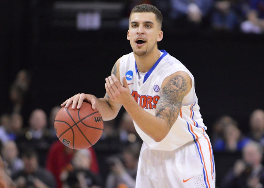 <p align="justify">Scottie Wilbekin calls out a play to his teammates during Florida’s 62-52 win against Dayton on Saturday in FedExForum. Wilbekin was named the Most Outstanding Player of the South Region of the NCAA Tournament after the Gators defeated the Flyers.</p>