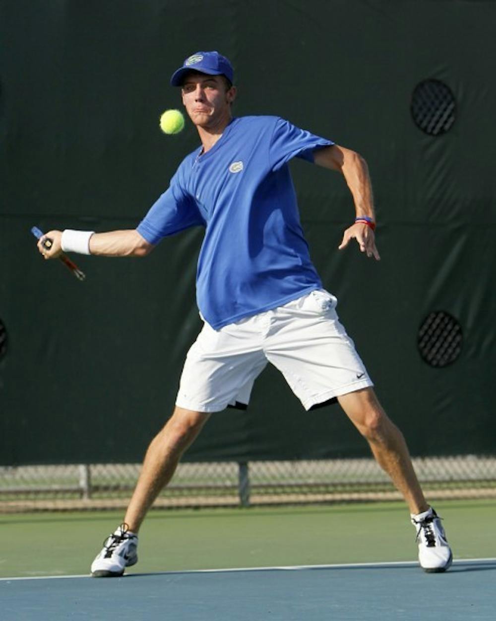 <p>UF senior Bob van Overbeek returns a volley. Van Overbeek won only his second match since Feb. 3 against Ole Miss on Friday.</p>