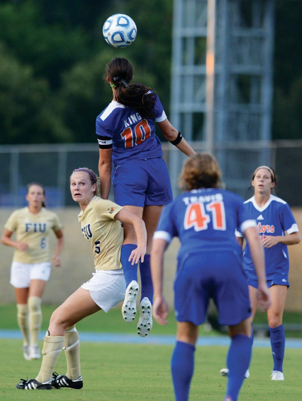 <p>Senior midfielder Holly King attempts a header in UF's 3-0 win against FIU on Sept. 2 at James G. Pressly Stadium. King has scored twice on headers this season.</p>