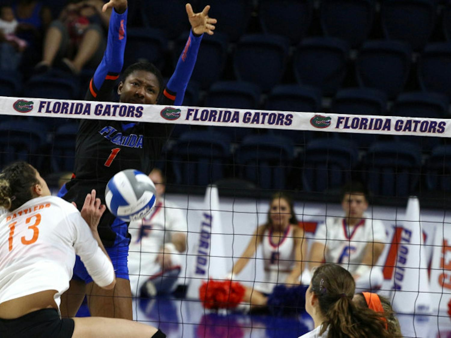 Rhamat Alhassan jumps up to block the ball during Florida's 3-0 win against Florida A&amp;M on Sept. 15, 2017, at the O'Connell Center.