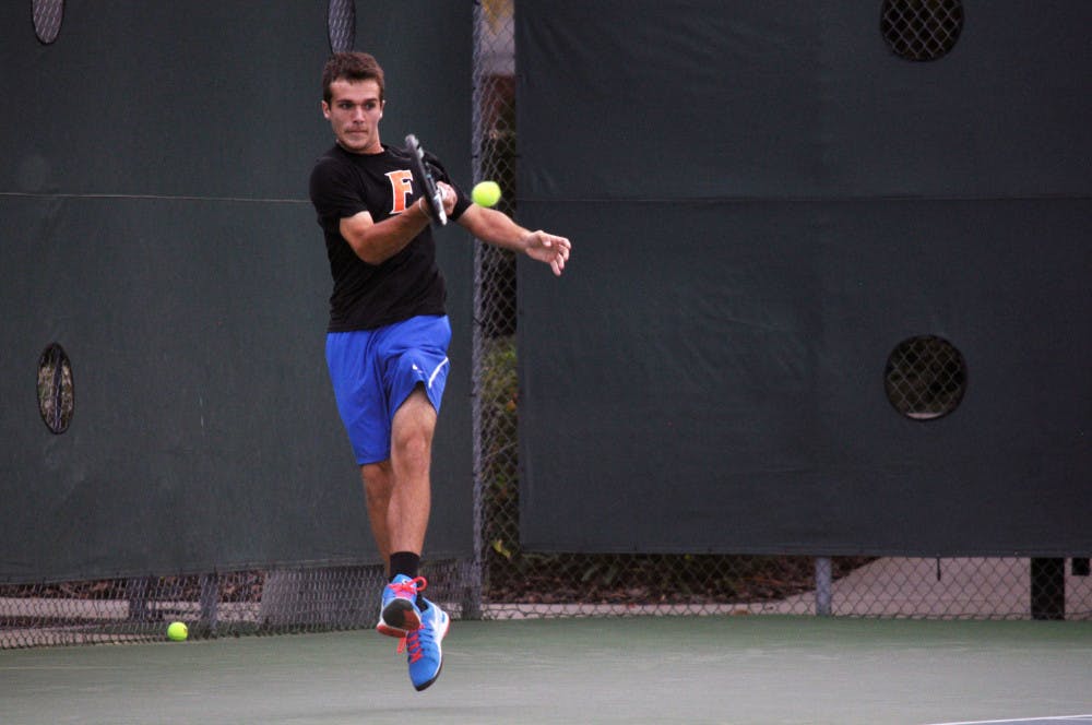 Chase Perez-Blanco returns a ball during Florida's 4-1 win against Mississippi State on March 13 at the Ring Tennis Complex.