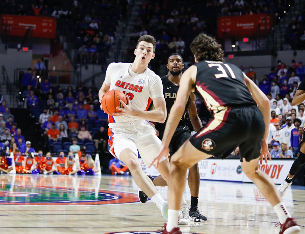 <p>Florida&#x27;s Colin Castleton takes the ball up the court during a Nov. 14 game against Florida State. Castleton led the Gators in points and minutes played Saturday in a crucial victory over Ole Miss.</p>