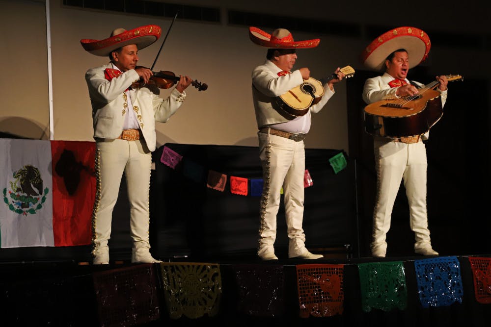 <p dir="ltr"><span>Mariachi members celebrate the living and dead Friday night at the Día de Los Muertos event put on by the UF Mexican-American Student Association and GatorNights. In addition to live music, the event also offered food, crafts and face painting.</span></p><p><span> </span></p>