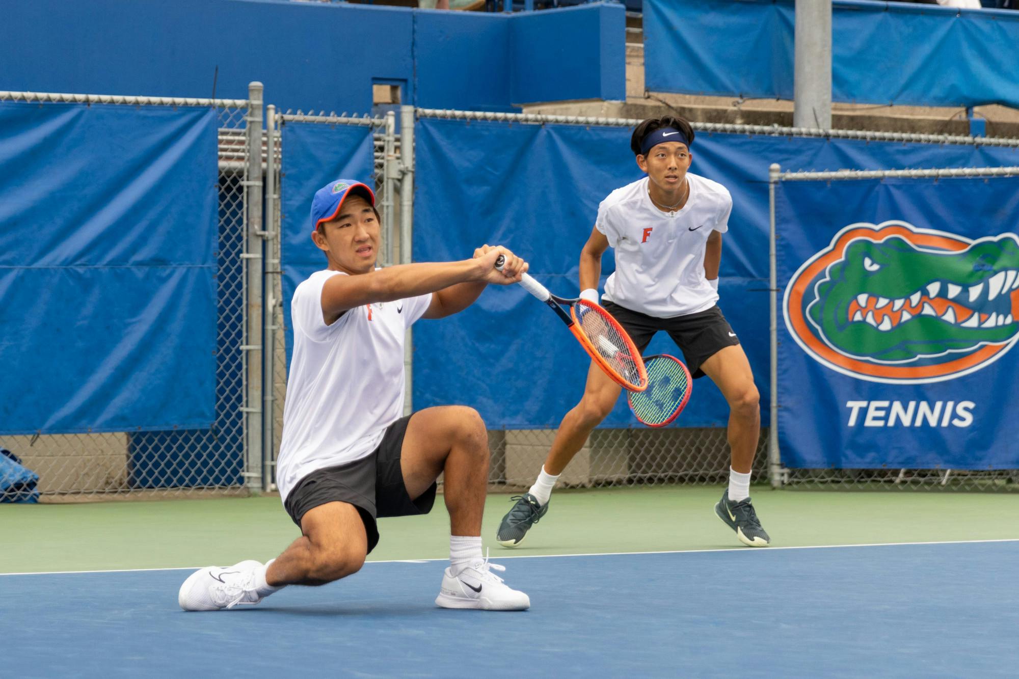 Jeremy Jin (left) and Aidan Kim (right) deliver a 6-1 rout in a doubles match against Citadel, Jan. 19, 2024.