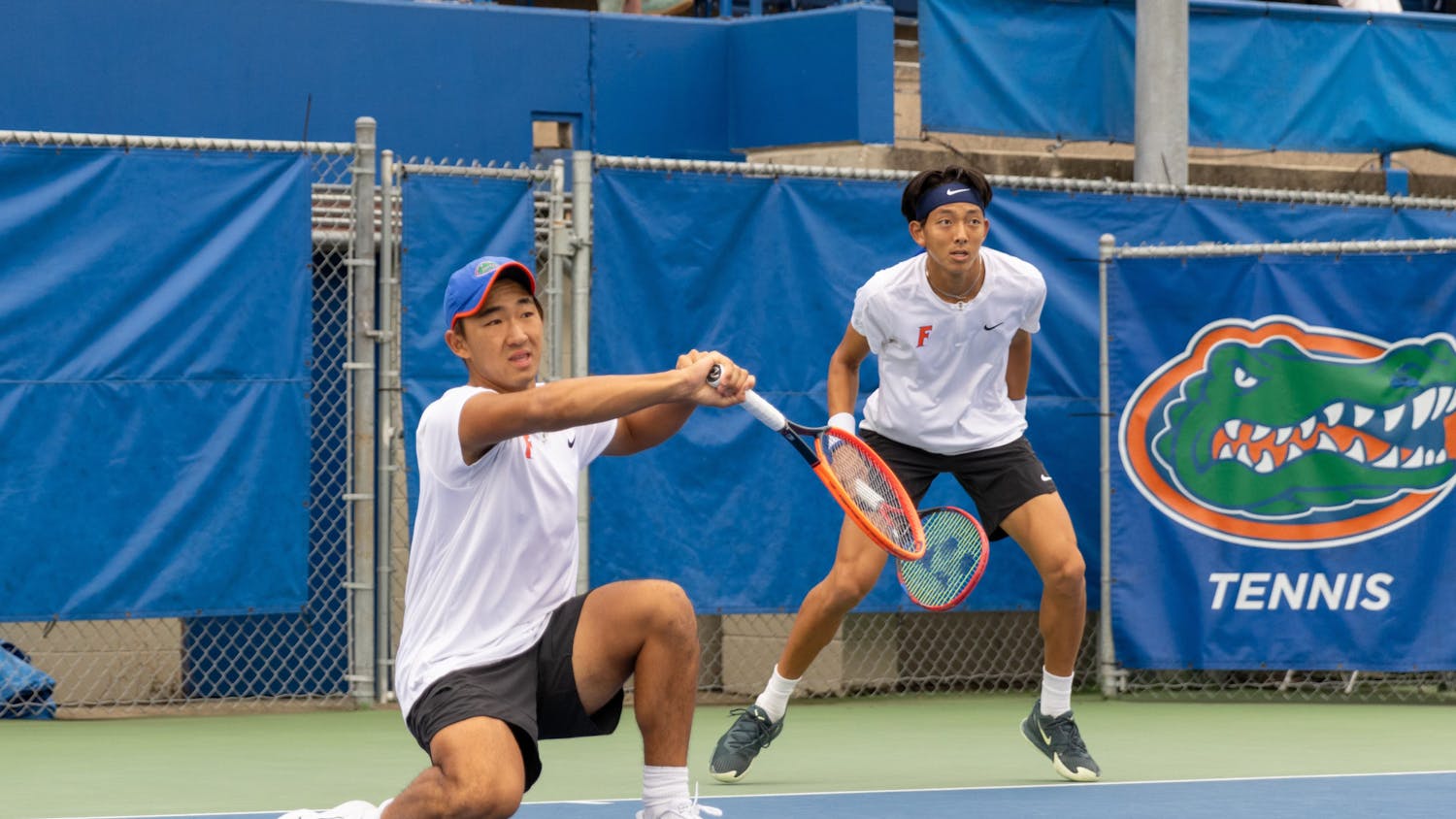 Jeremy Jin (left) and Aidan Kim (right) deliver a 6-1 rout in a doubles match against Citadel, Jan. 19, 2024.