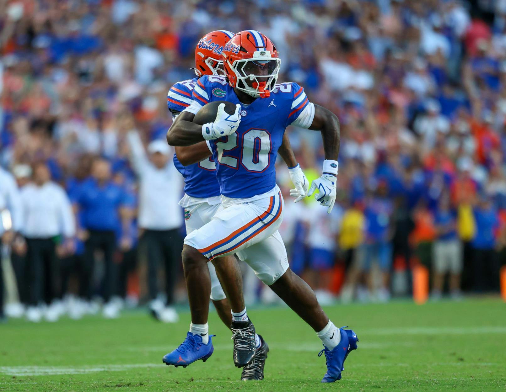 Florida running back Duke Clark (20) runs the ball during an NCAA college football game against Ole Miss, Saturday, Sept. 26, 2026, in Gainesville, Fla.
