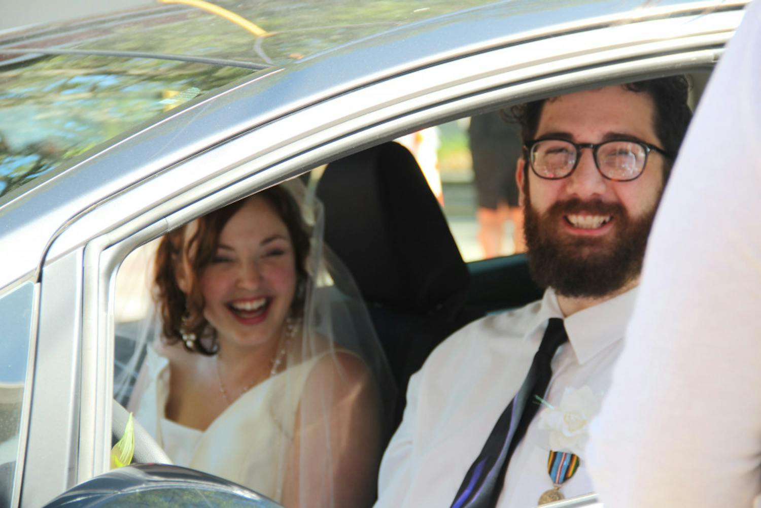 Decked in veils, flowers and formal wear, couples from across Florida drove cars, trucks and limousines to the drive-thru-turned-“Wedding Window.” They pronounced their love to each other at the Alachua County Family and Civil Courthouse from about 5 to 11 p.m. Thursday. 
Read more here.