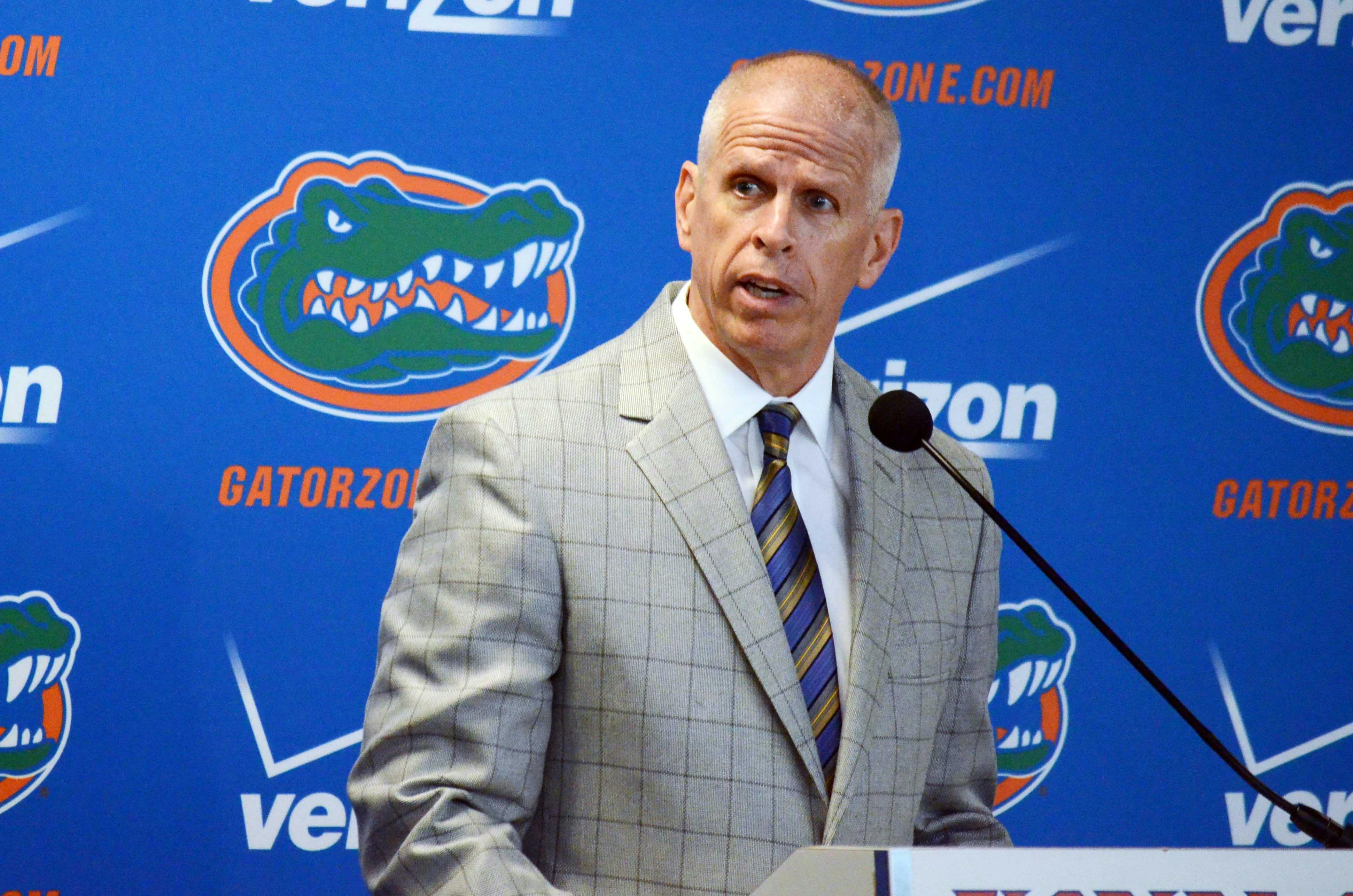 UF athletics director Jeremy Foley speaks during new head football coach Jim McElwain's opening press conference on Saturday in Ben Hill Griffin Stadium.