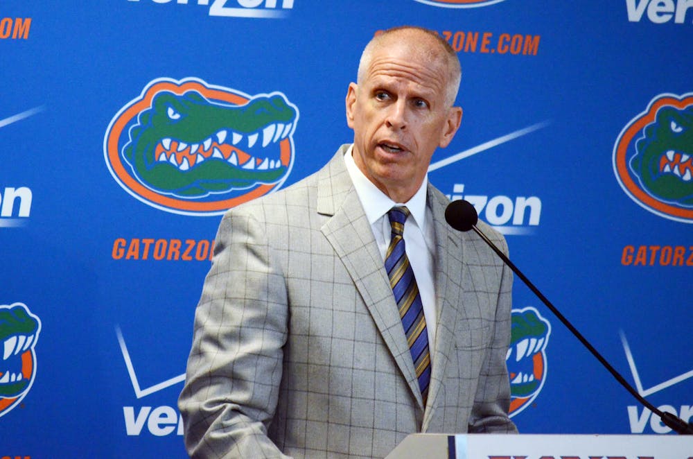 <p>UF athletics director Jeremy Foley speaks during new head football coach Jim McElwain's opening press conference on Saturday in Ben Hill Griffin Stadium.</p>